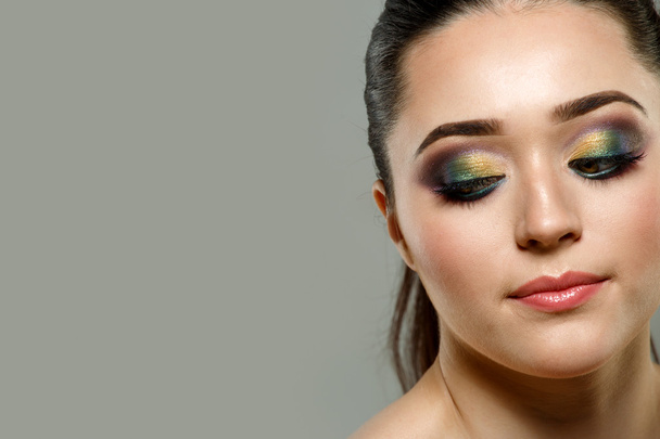 Close up portrait of beautiful young woman face. Makeup concept. - Zdjęcie, obraz