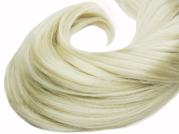 Cheveux blonds posés en épaisse boucle
 - Photo, image
