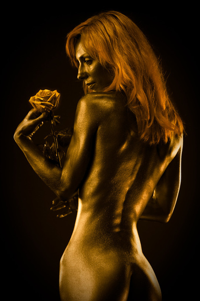 Golden statue of woman - Photo, image