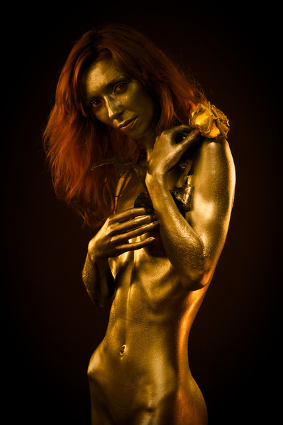 Golden redhead statue - Fotó, kép