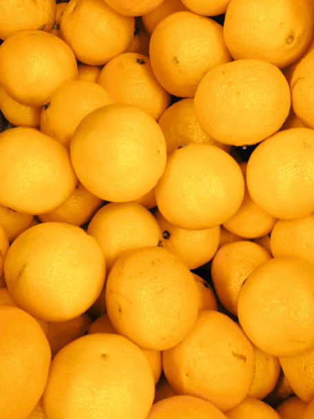 Fresh oranges on market photo. - Zdjęcie, obraz