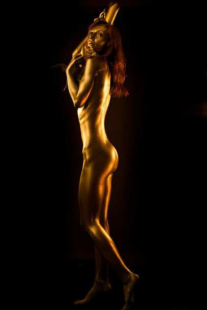 Gouden roodharige standbeeld - Foto, afbeelding