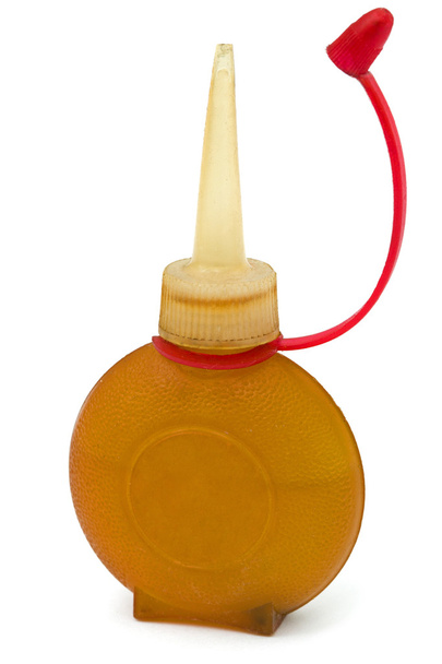 Vieille bouteille d'huile de machine à lubrifier, isolée sur fond blanc
 - Photo, image