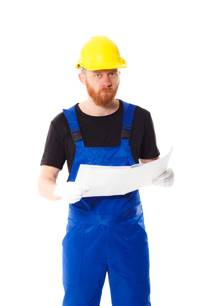 Man builder in the uniform, isolated - Photo, image