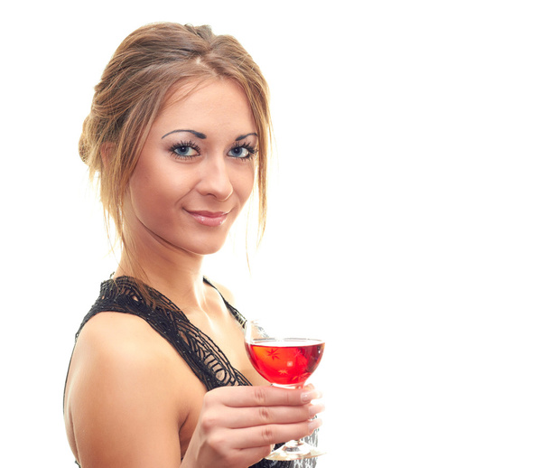 Smiling woman holding a glass of wine - 写真・画像