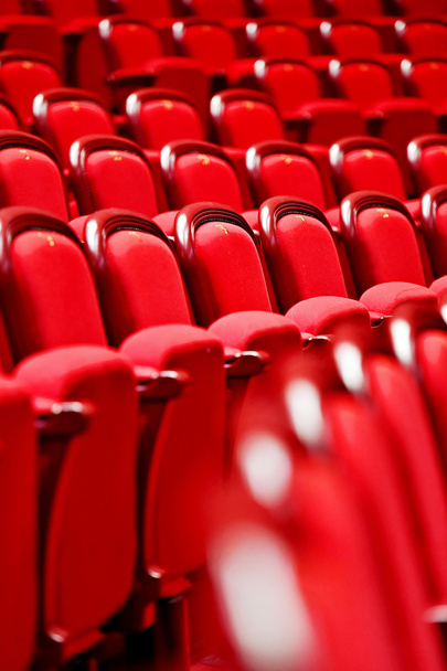 Rows with empty seats in a theater - 写真・画像