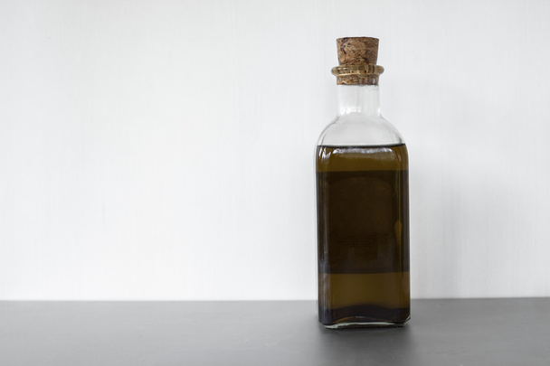 Full shot oil in glass container isolated - Foto, Imagem