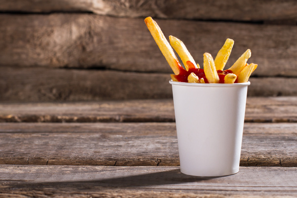 Fries with sauce in cup. - Photo, Image