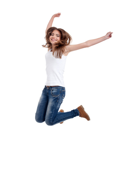 Happy teen girl jumping, isolated on white background - Photo, Image