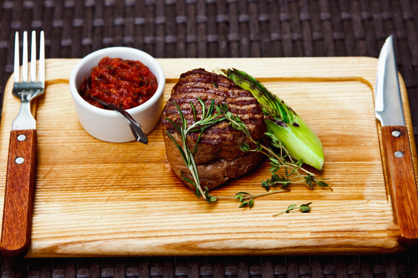 Beautiful juicy well done steak - Фото, изображение
