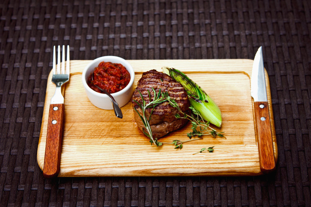 Beautiful juicy well done steak - Фото, изображение