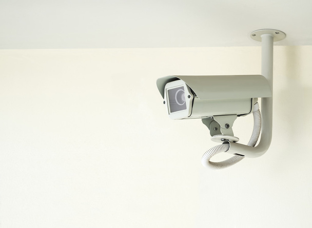 cctv camera installed on ceiling in indoor security system - Fotoğraf, Görsel
