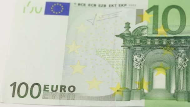 Close-up foto van een deel van een honderd euro opmerking. Macro schot - Video