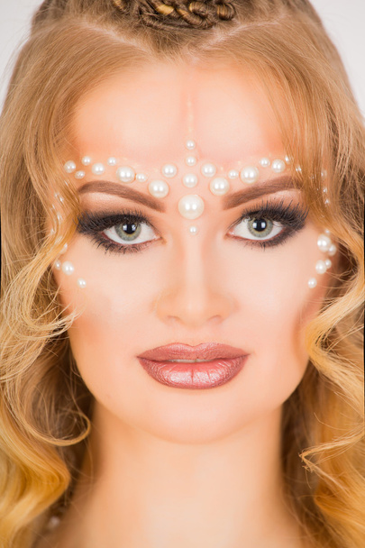 Pearls on the face  - Foto, imagen