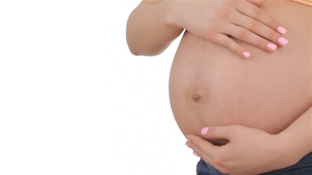 Mujer embarazada acaricia su barriga
 - Metraje, vídeo