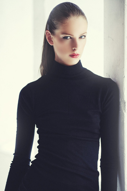 Brunette woman in black sweater - Zdjęcie, obraz