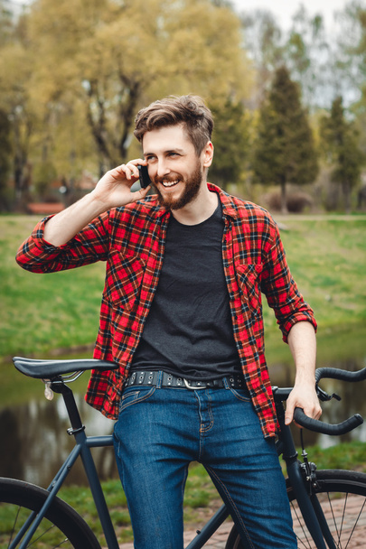 Handsome Young Man With Bicycle - 写真・画像