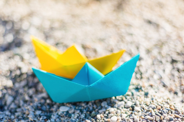 paper boats on beach  - Фото, изображение