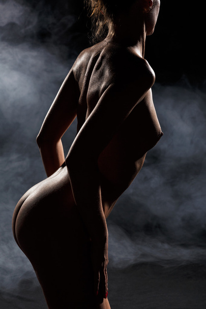 Naked woman in darkness - Photo, Image