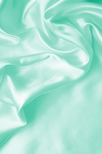 Smooth elegant green silk or satin texture as background - Фото, зображення