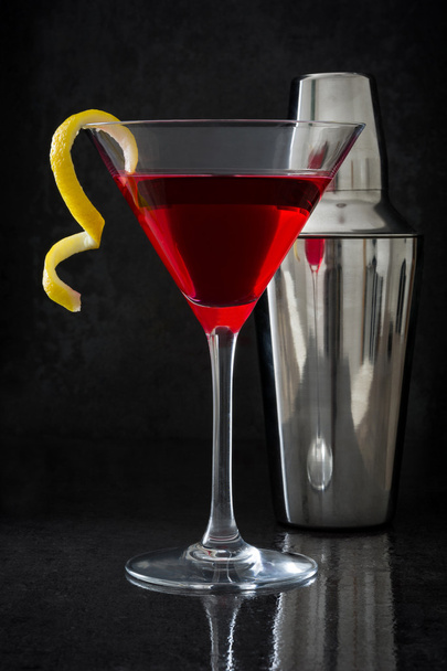 Cosmopolitan cocktail on black background - Фото, зображення