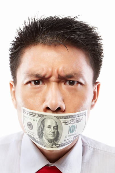 Bribe concept, mouth sealed with dollar bill - Foto, immagini