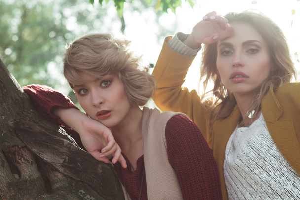 fashion women posing together outdoor - Fotografie, Obrázek