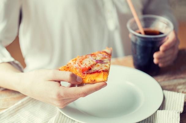 close up of woman with pizza and cola drink - Foto, imagen