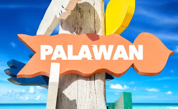 Palawan signpost with beach
 - Фото, изображение
