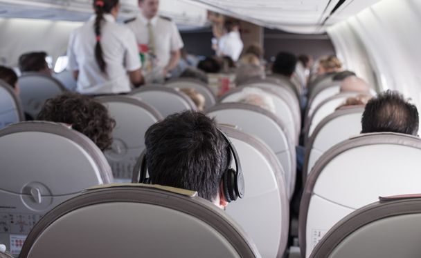 Interior of airplane with passengers  - Valokuva, kuva