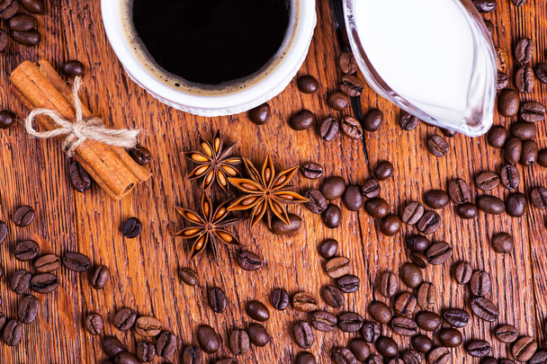 black coffee on a wooden background - Fotó, kép