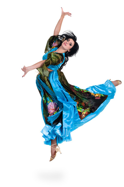 gypsy woman jumping against isolated white background - Φωτογραφία, εικόνα