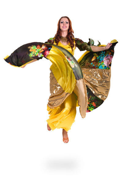 gypsy woman jumping against isolated white background - Valokuva, kuva