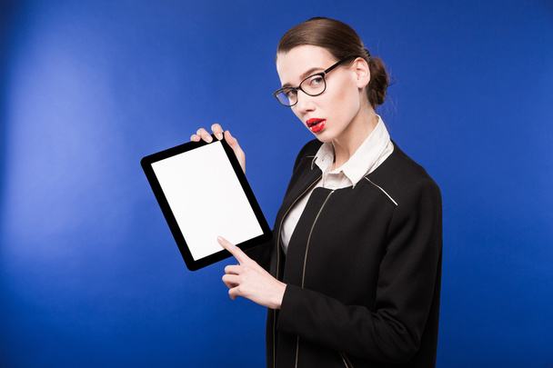 close-up portrait of a girl with a tablet in hands - Photo, Image