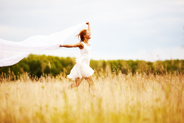 girl running through field - Photo, Image