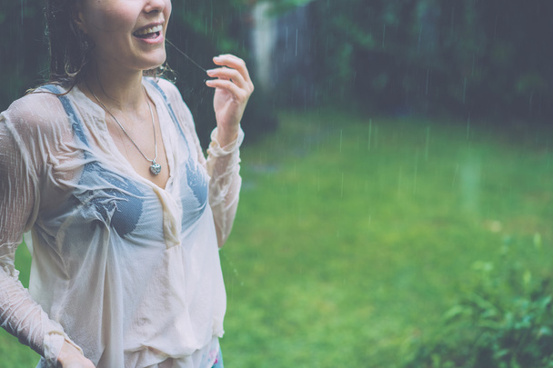 girl standing at tropical rain - Фото, зображення