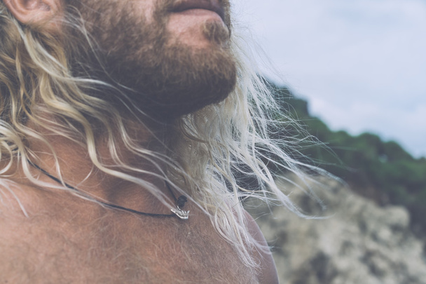 Brutal man surfer with long white hair . - Photo, image