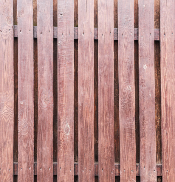Brown wooden fence. - Фото, изображение