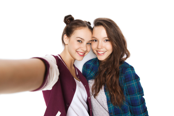 happy smiling pretty teenage girls taking selfie - Foto, Bild