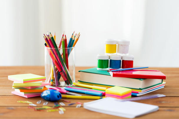 close up of stationery or school supplies on table - Foto, Bild