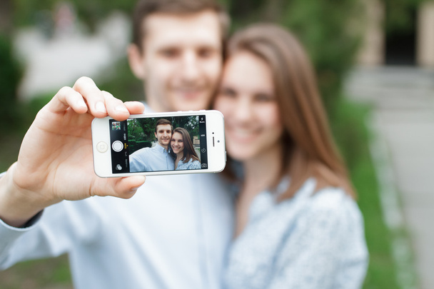 Loving couple taking selfie - Фото, изображение
