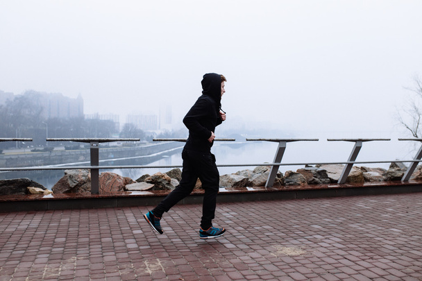 Sporty man jogging  - Valokuva, kuva