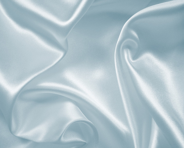 Smooth elegant grey silk or satin texture as background   - Photo, image