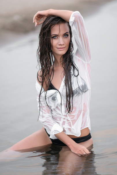 portrait of a beautiful sexy woman on the beach  - Fotografie, Obrázek