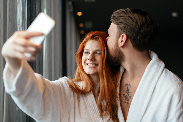 Couple in love taking selfies  - Valokuva, kuva