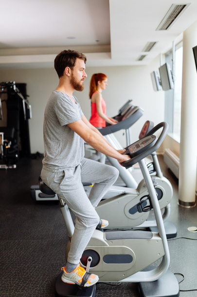 People cardio workout in gym - 写真・画像
