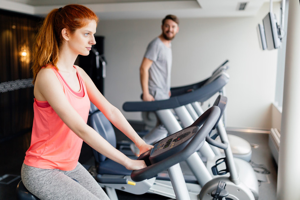 People cardio workout in gym - Foto, immagini