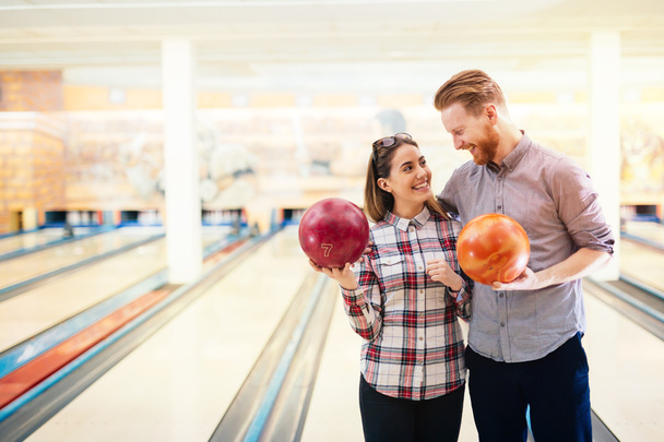 Couple enjoying bowling together - Fotó, kép