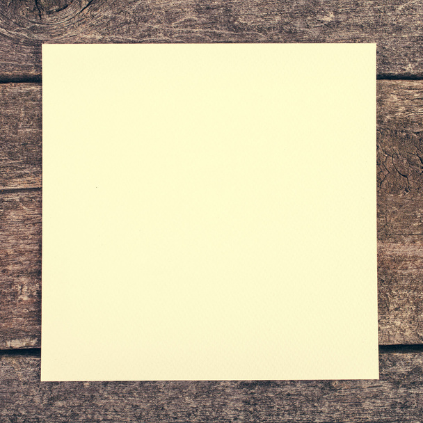 wooden background with blank paper - Foto, immagini