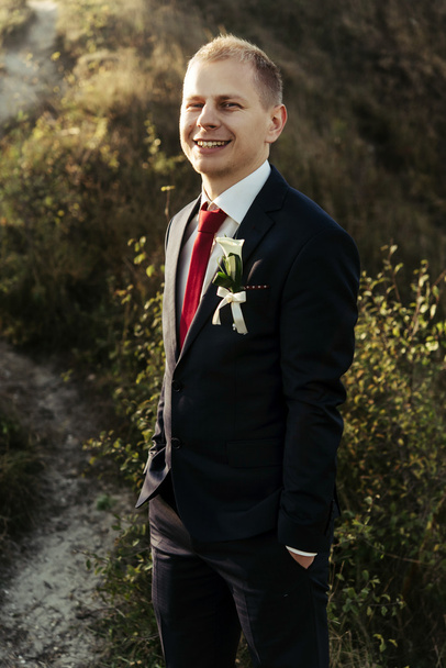 happy stylish handsome groom - Fotó, kép